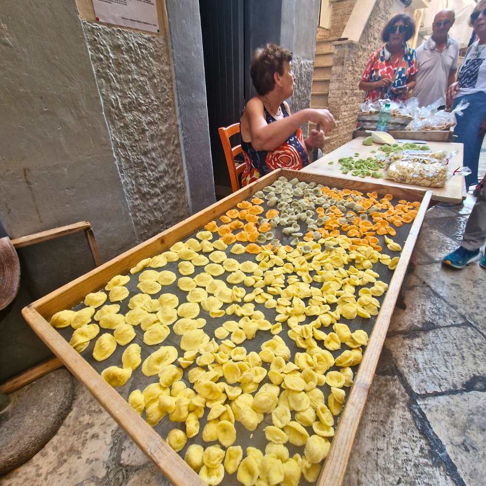 Orecchiette pasta hand-made on the street